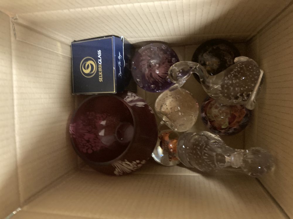 A large collection of glass salts and other items, including paperweights, animal figures, vases, dishes, etc.